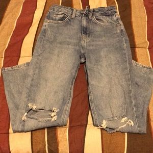 Wild fable high rise mom jean. Ripped knee